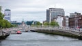 River Liffey, Ha`Penny Bridge and the Heineken Building / OÃ¢â¬â¢Connell Bridge House